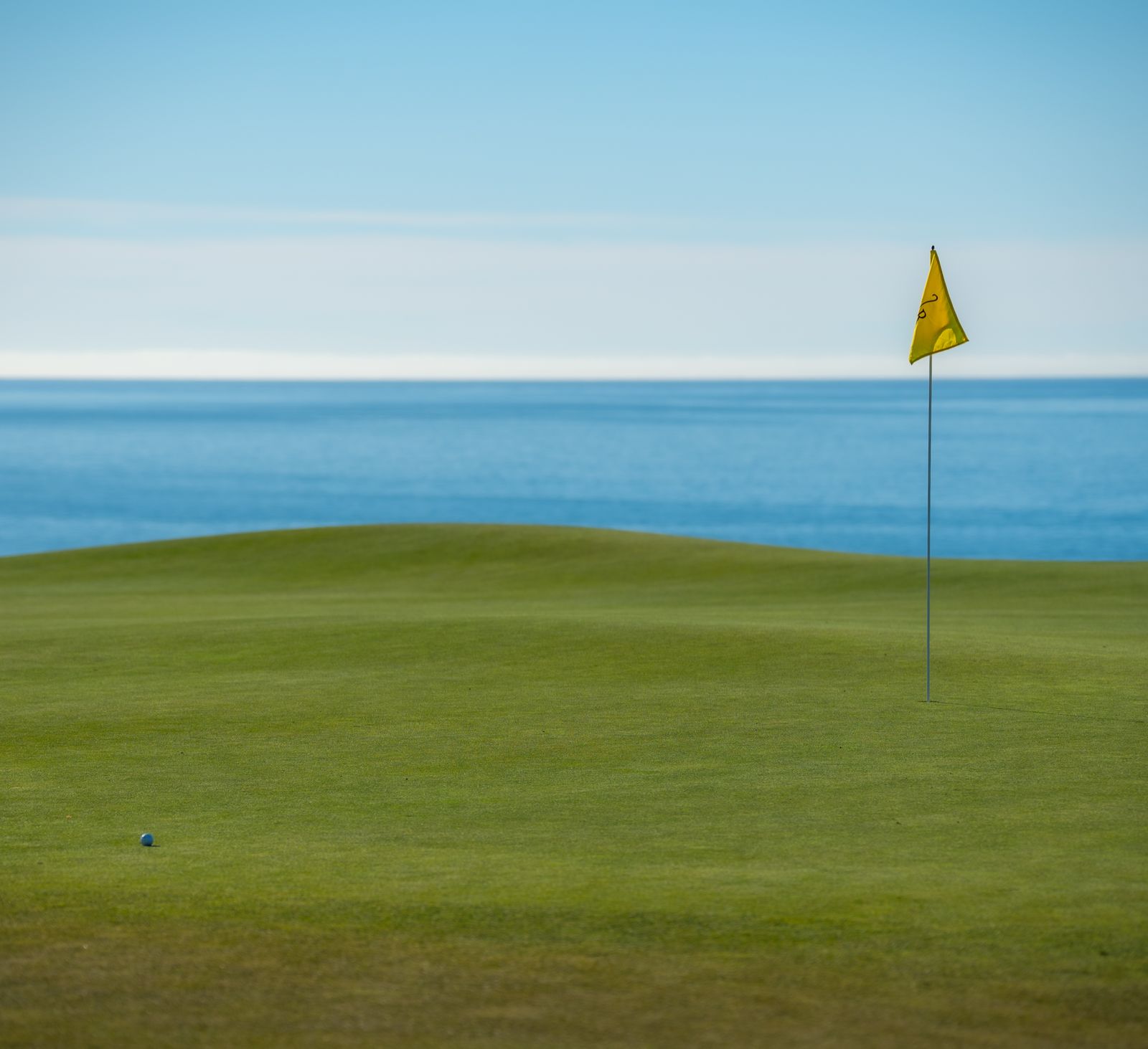 Coastal golf green overlooking the ocean